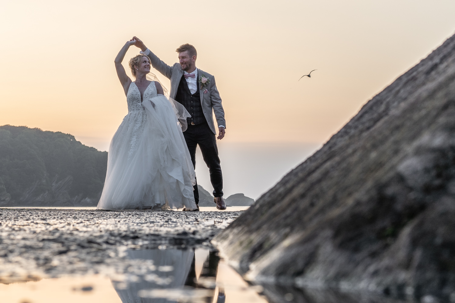 bride and groom dancing at north devon coastal wedding in the twilight